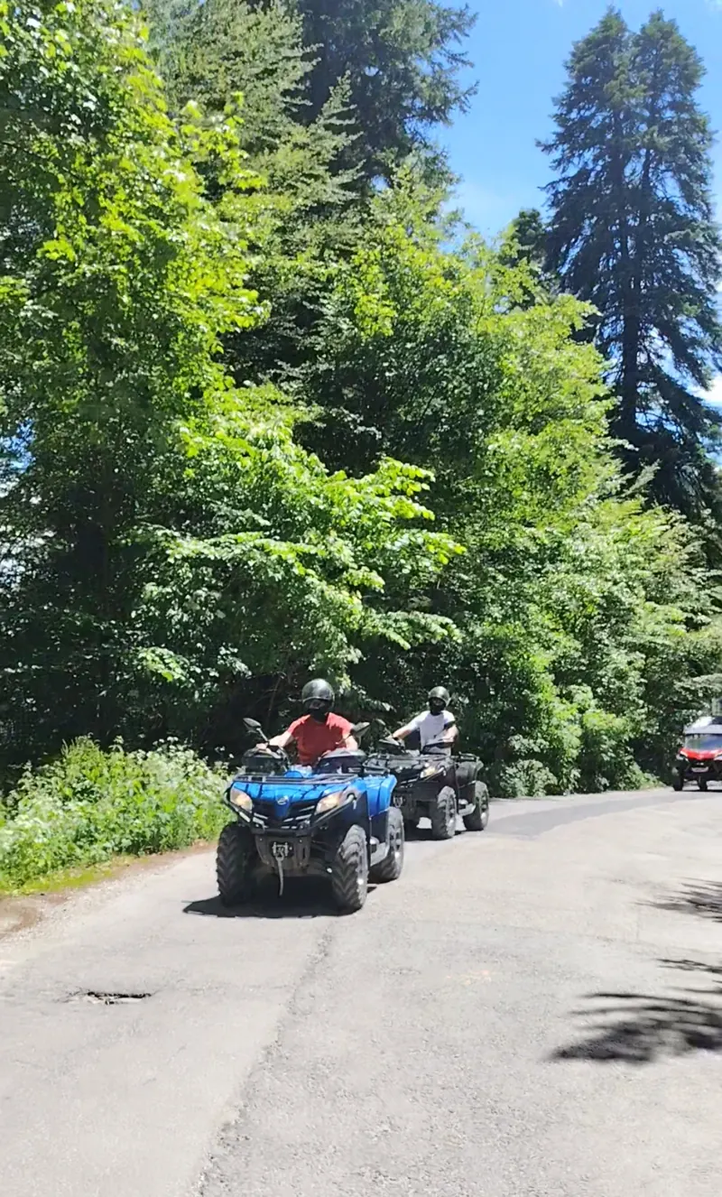 Two ATVs on the Forest Road on a sunny day, Sinaia