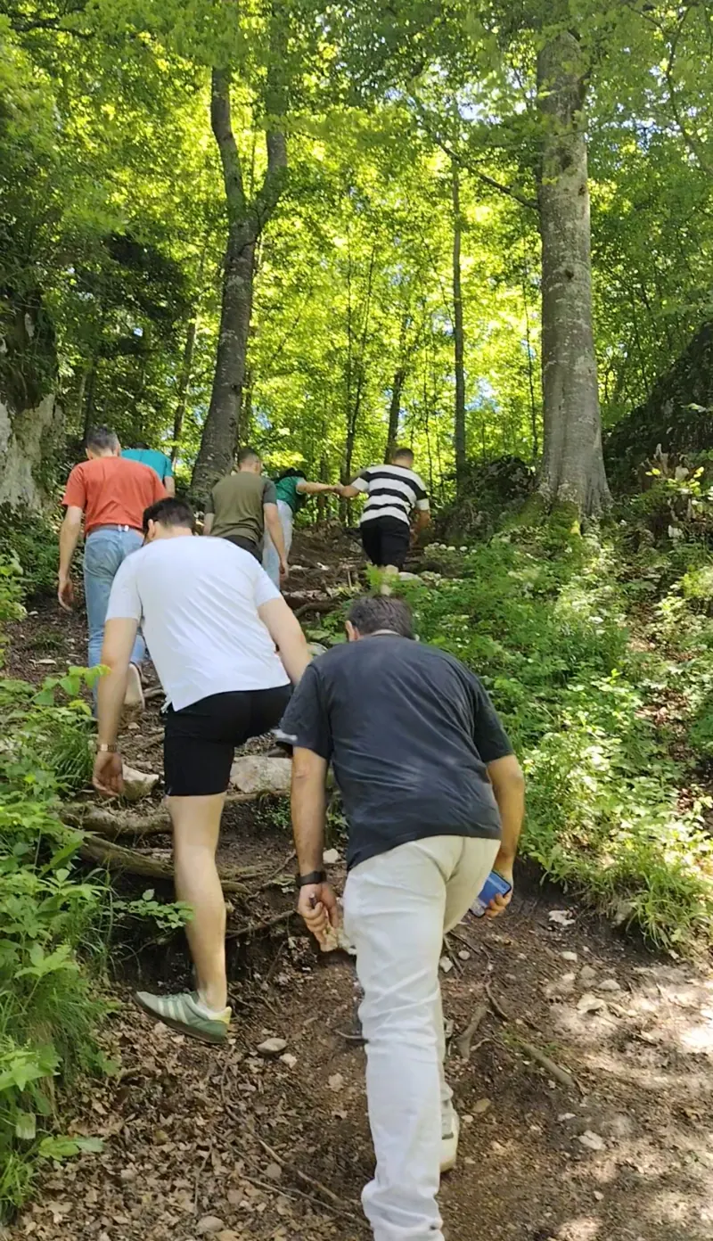Group of tourists climbing the path to the Franz Joseph Cliffs, Bucegi Mountains